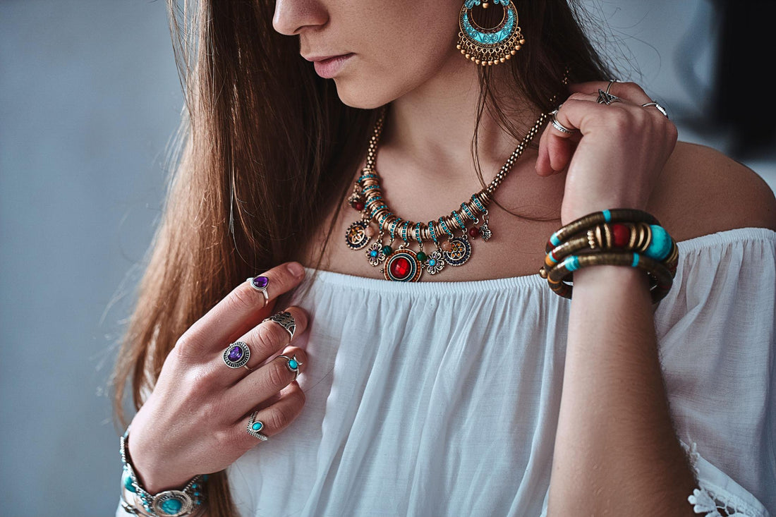 Boho chic rings styled in a bohemian flat lay - turquoise gemstone and stacked gold rings by My Boho Chic
